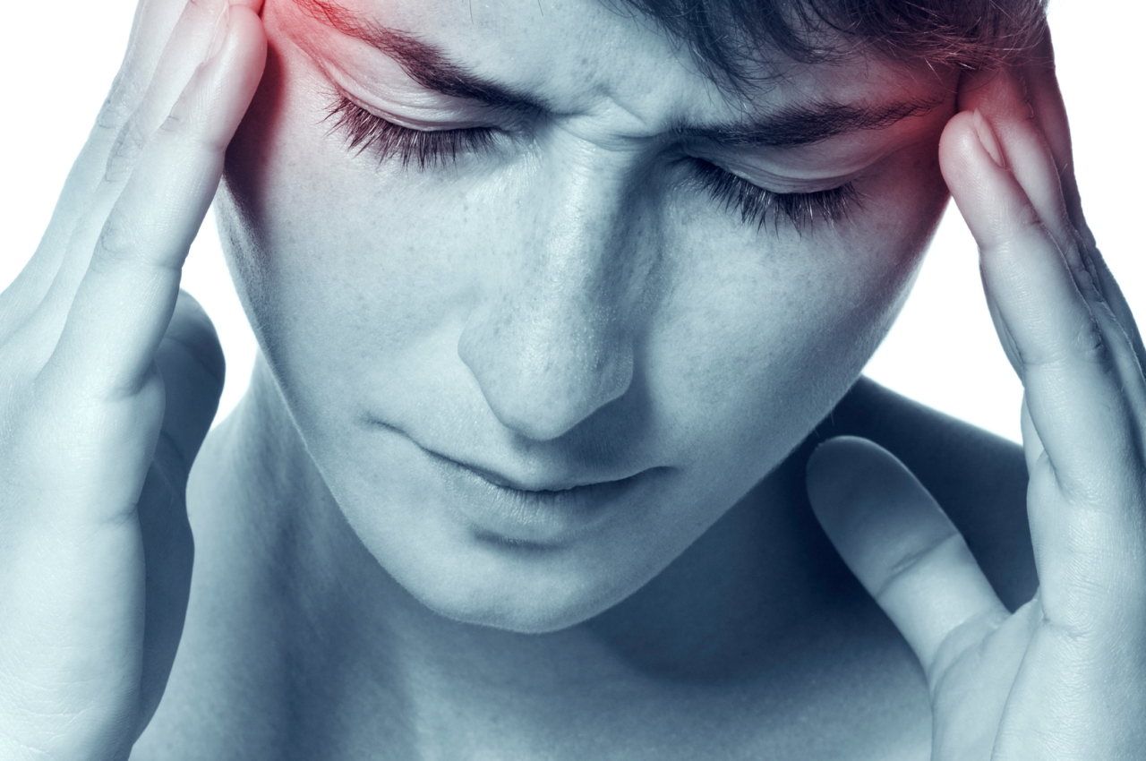 Indian woman experiencing a migraine at home in panchkula